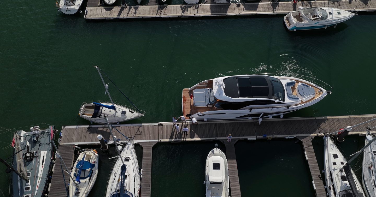 Fairline Targa 58 GTO alongside a marina berth viewed from above
