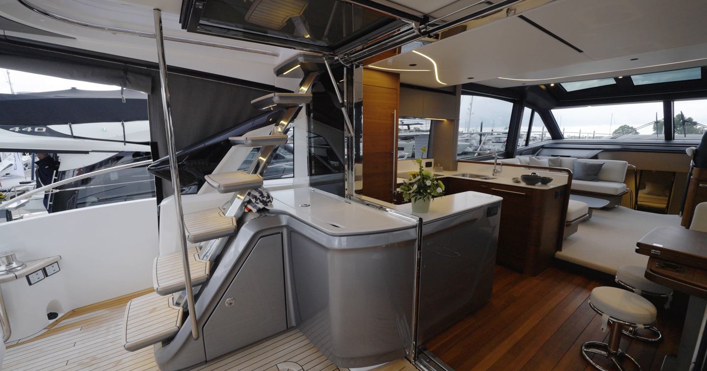 Princess S65 Mk2 cockpit bar and sportsbridge staircase beside the aft galley