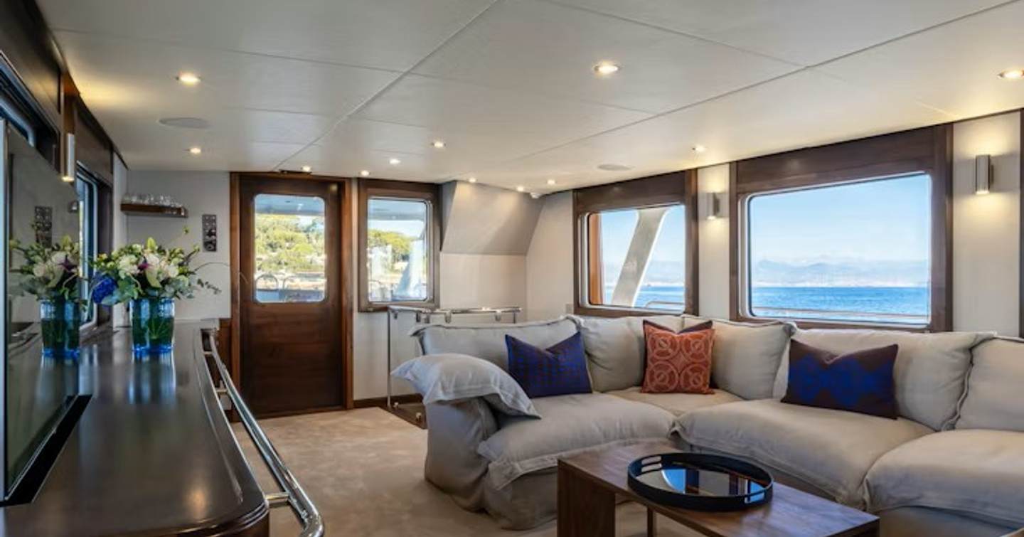 Motor yacht Sultana main saloon sofa area