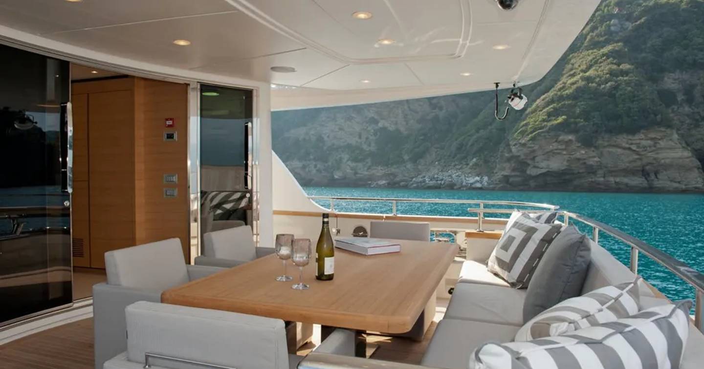 Motor yacht aft shaded dining area