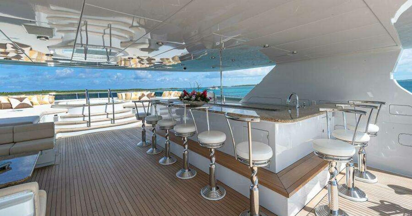 Superyacht Silver Lining's flybridge with wet bar and jacuzzi