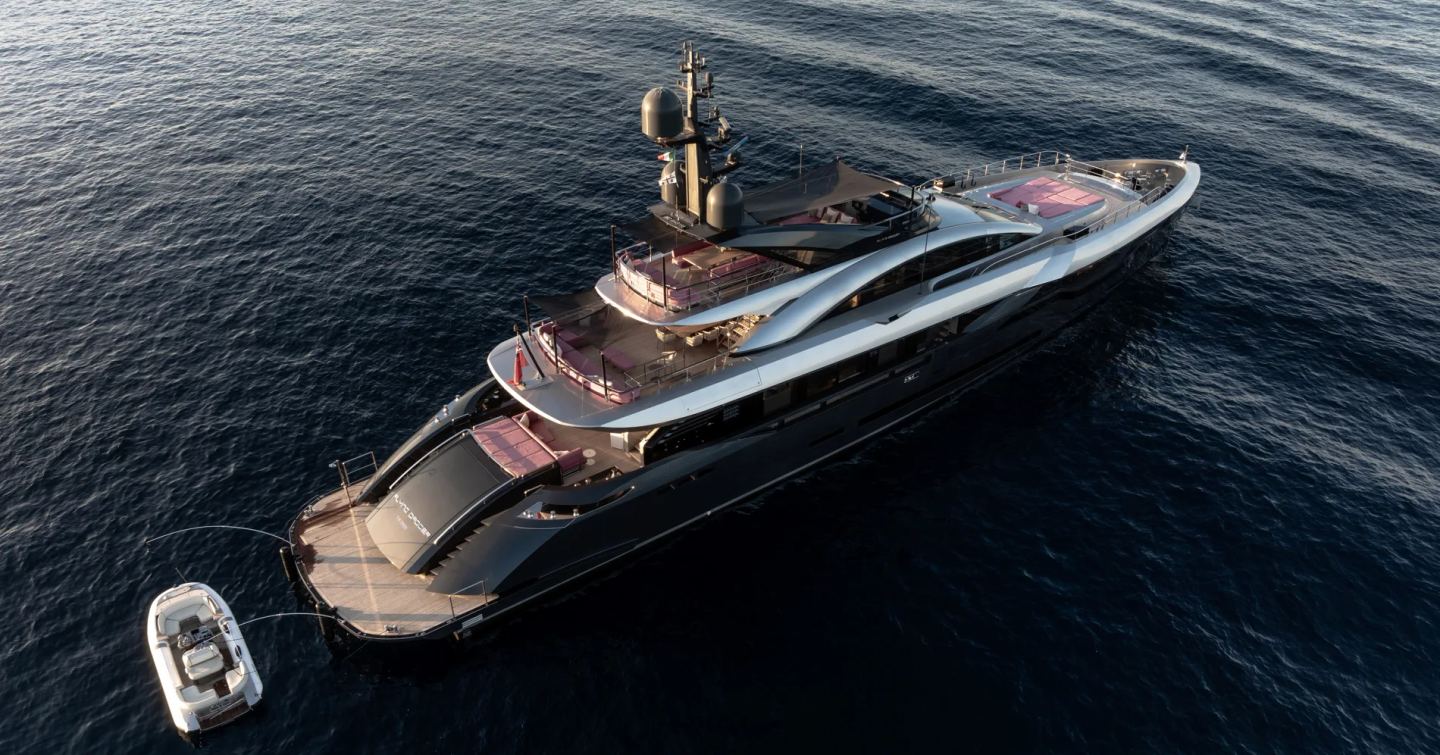Superyacht Flying Dagger III at anchor with tender 