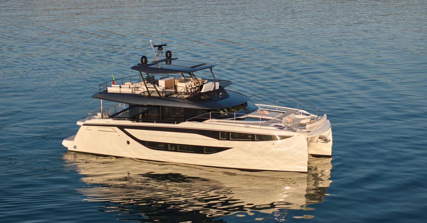 Prestige M8 Evo yacht at anchor side view 