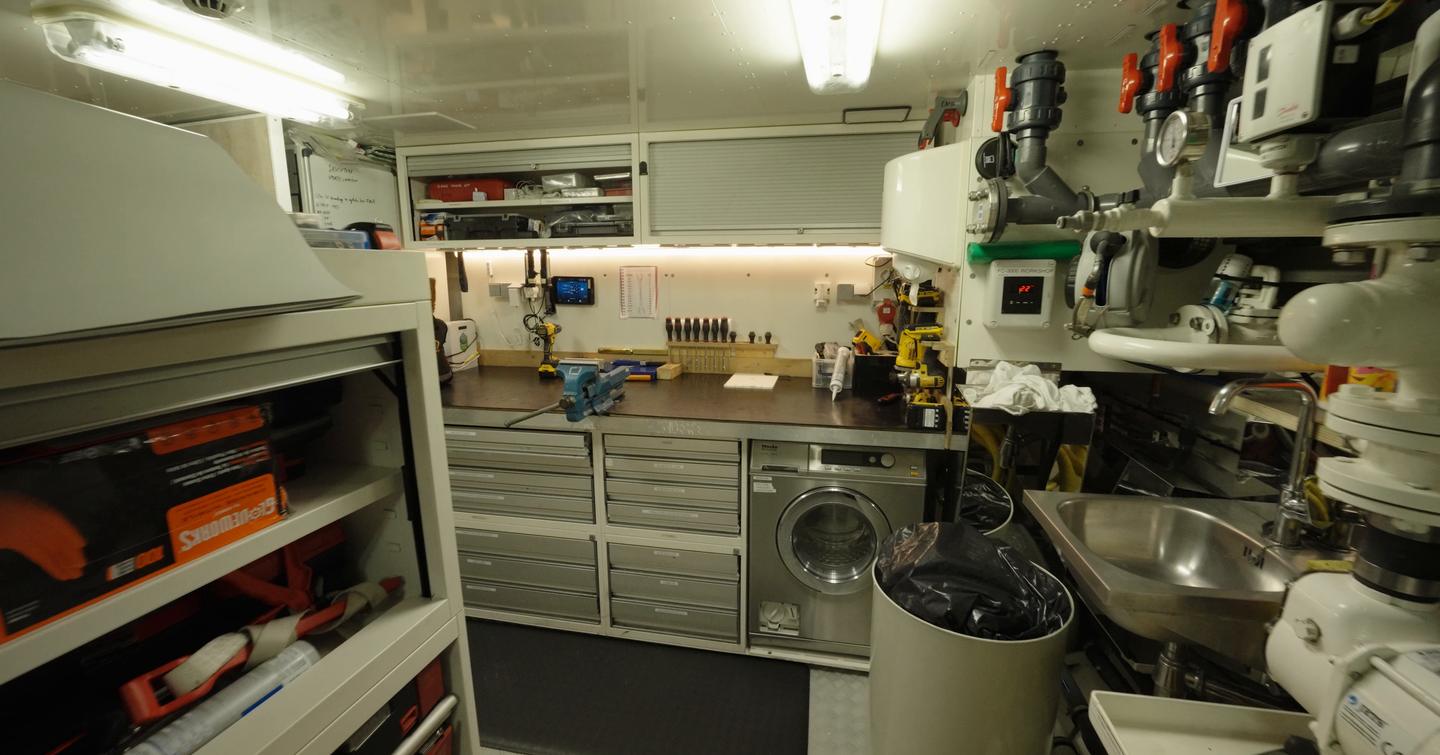 Engineer’s workshop on the Amels 242 Casino Royale with tools, workbench and storage for onboard maintenance.