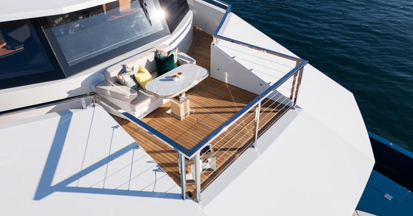 Crow's next on the motor yacht King Benji with seating and dining area along with sea views 