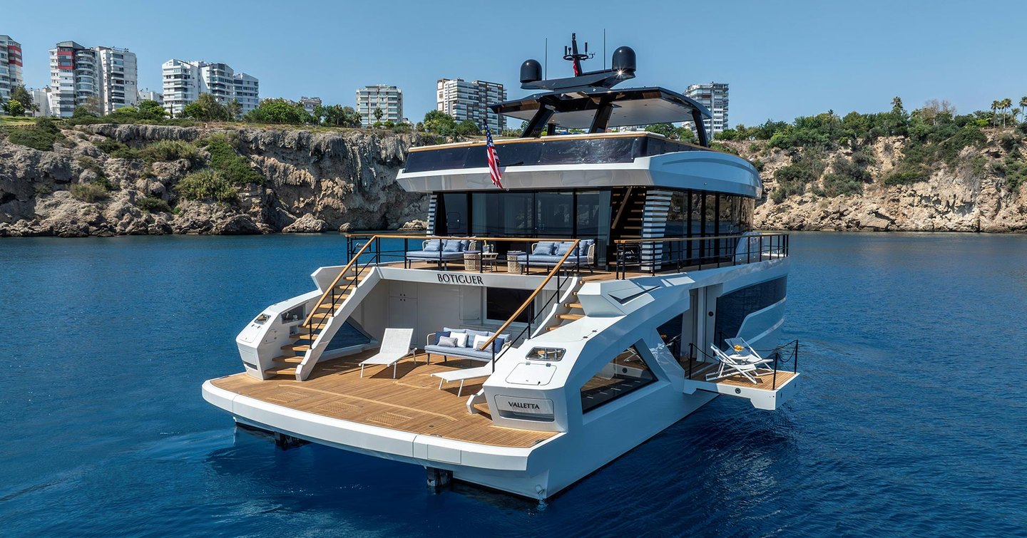 Lazzara LPC 300 Catamaran stern at anchor with fold out balcony