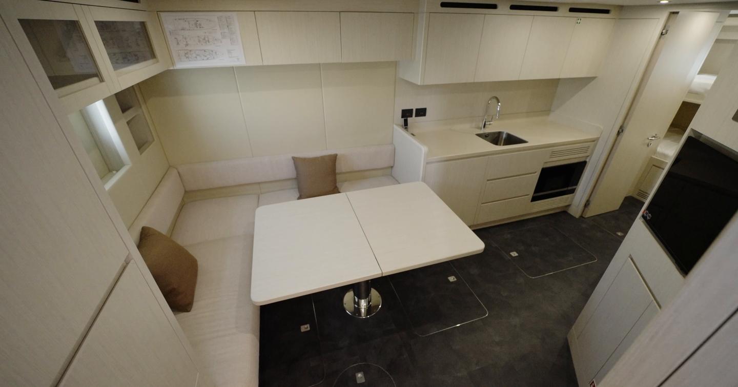 Crew mess with kitchenette aboard the Gulf Craft Majesty 100 Terrace