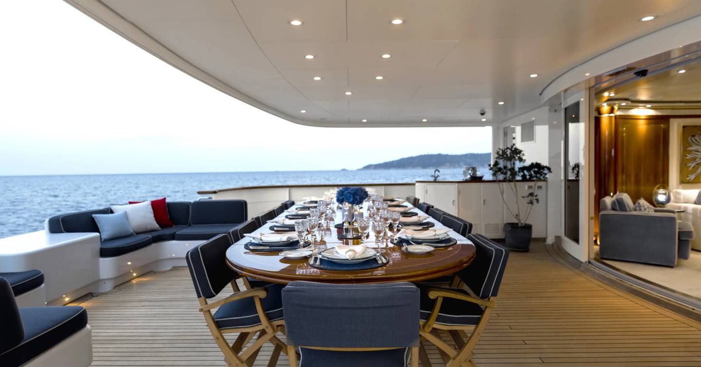 Superyacht Olympus aft deck dining area