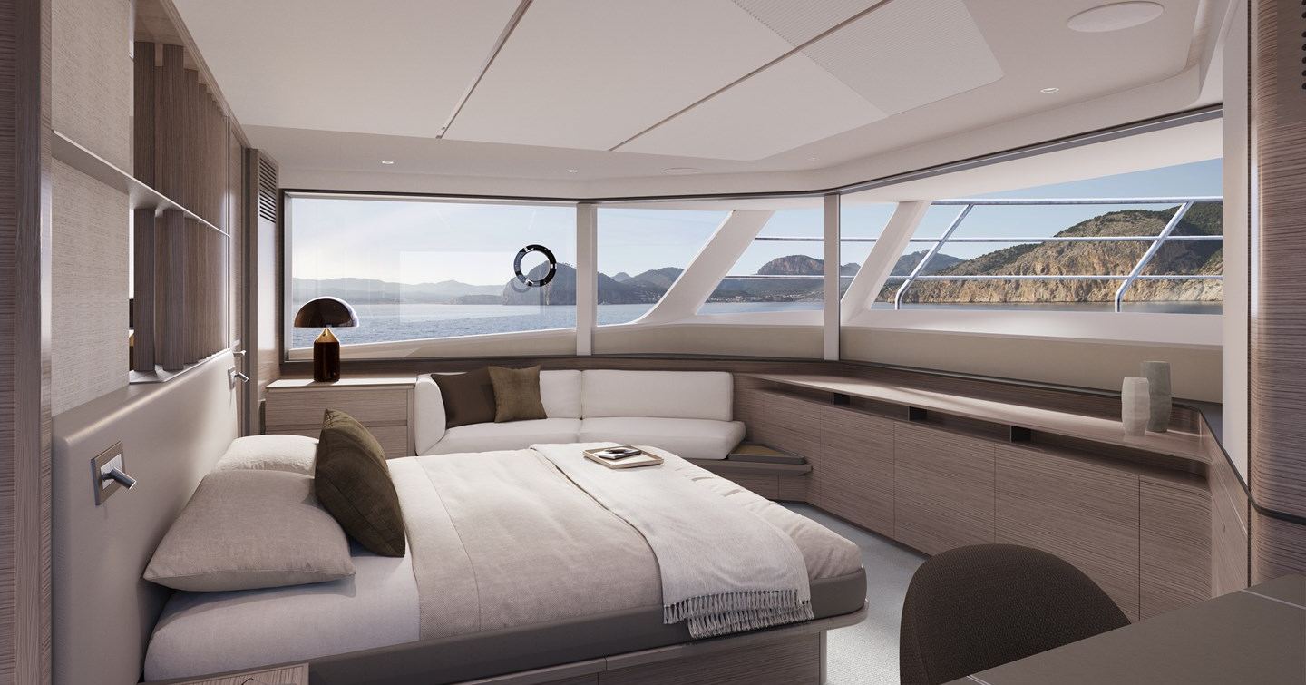 Owners cabin on board motor yacht X90, with wraparound windows and soft furnishings 