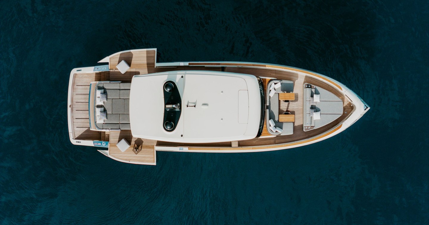 Aerial view of Invictus ST550 motor yacht at anchor