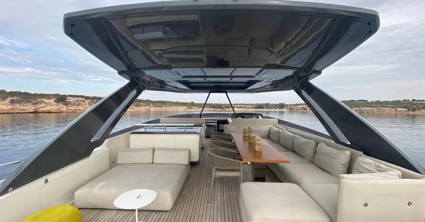 Motor Yacht Sunrise flybridge well U-shaped seating and alfresco dining 