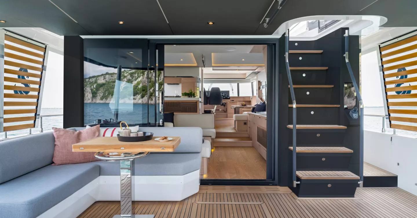 Beneteau Grand Trawler 63 motor yacht aft deck leading into saloon