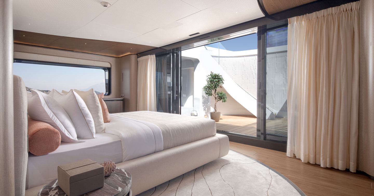 Sirena 42M superyacht master cabin with glass sliding doors 