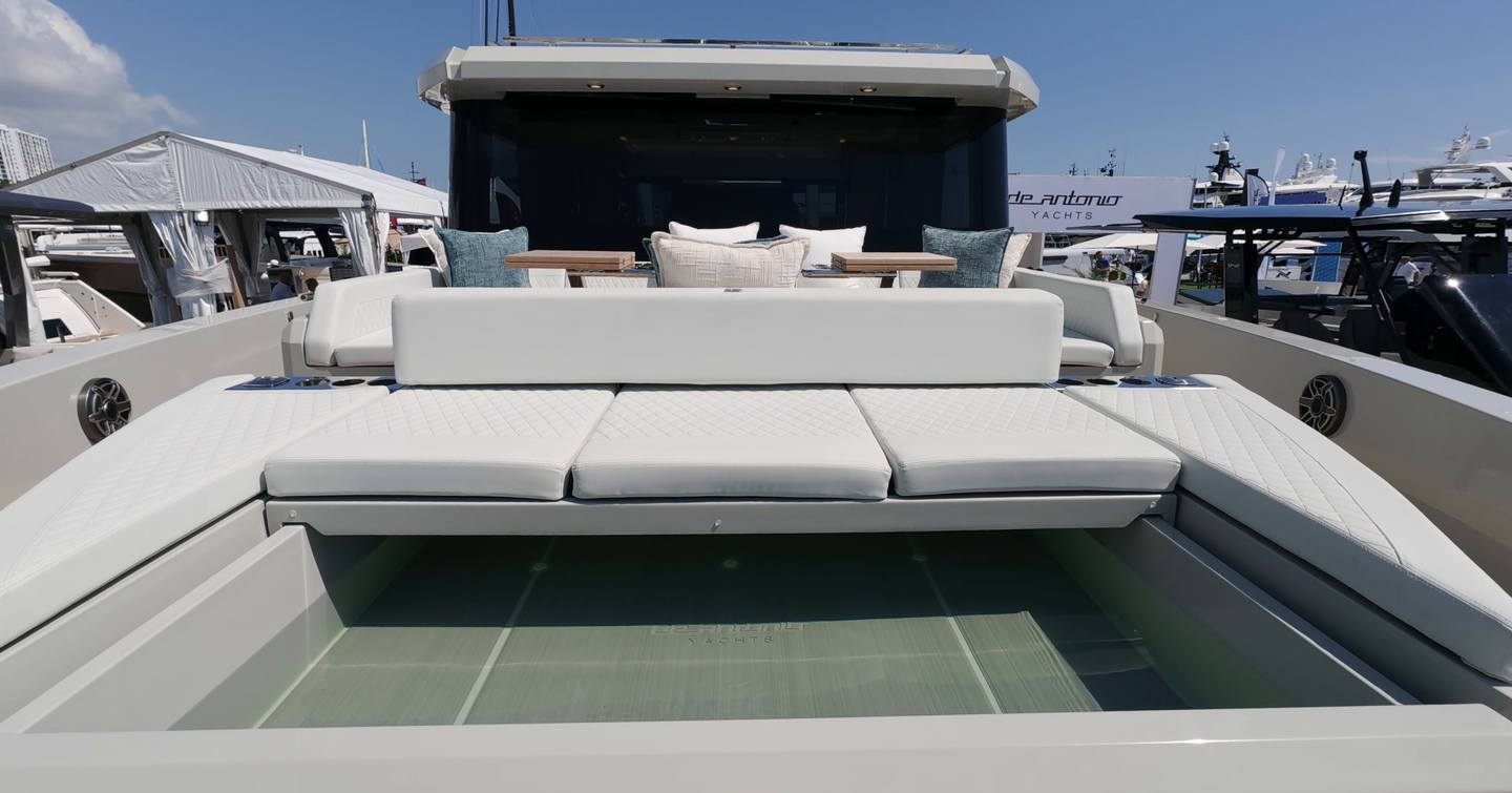 De Antonio D60 foredeck jacuzzi hidden beneath convertible sun pad seating
