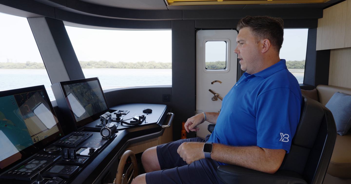 Captain's helm position aboard the Gulf Craft Majesty 100 Terrace with panoramic visibility
