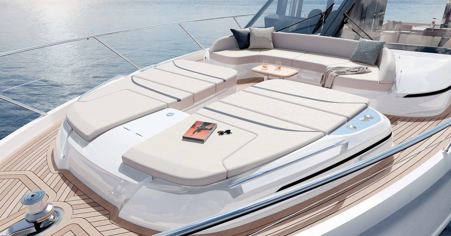 Princess S65 Mk2 foredeck with twin sunpads, forward seating and central table