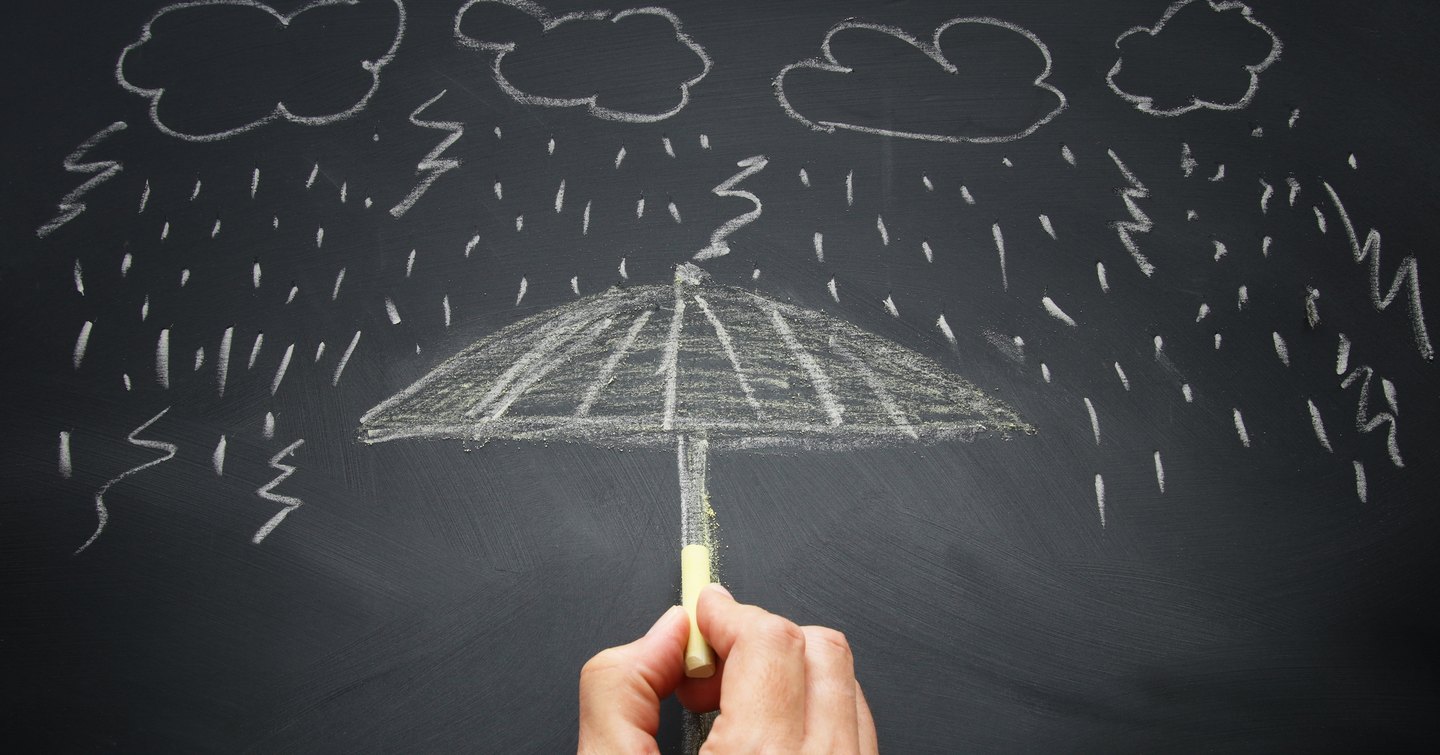 chalk board umbrella shielding lightning