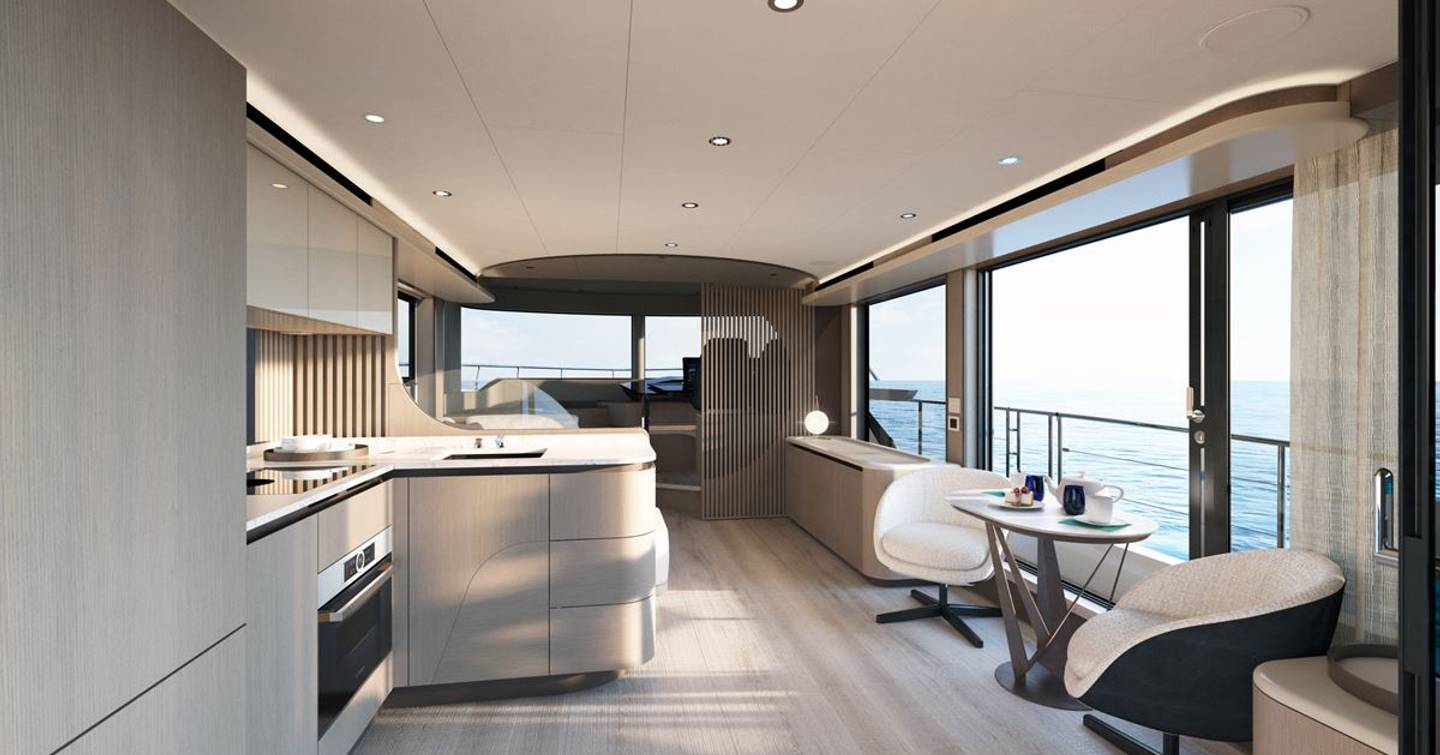 Absolute Navetta 58 motor yacht saloon with expansive glazing 