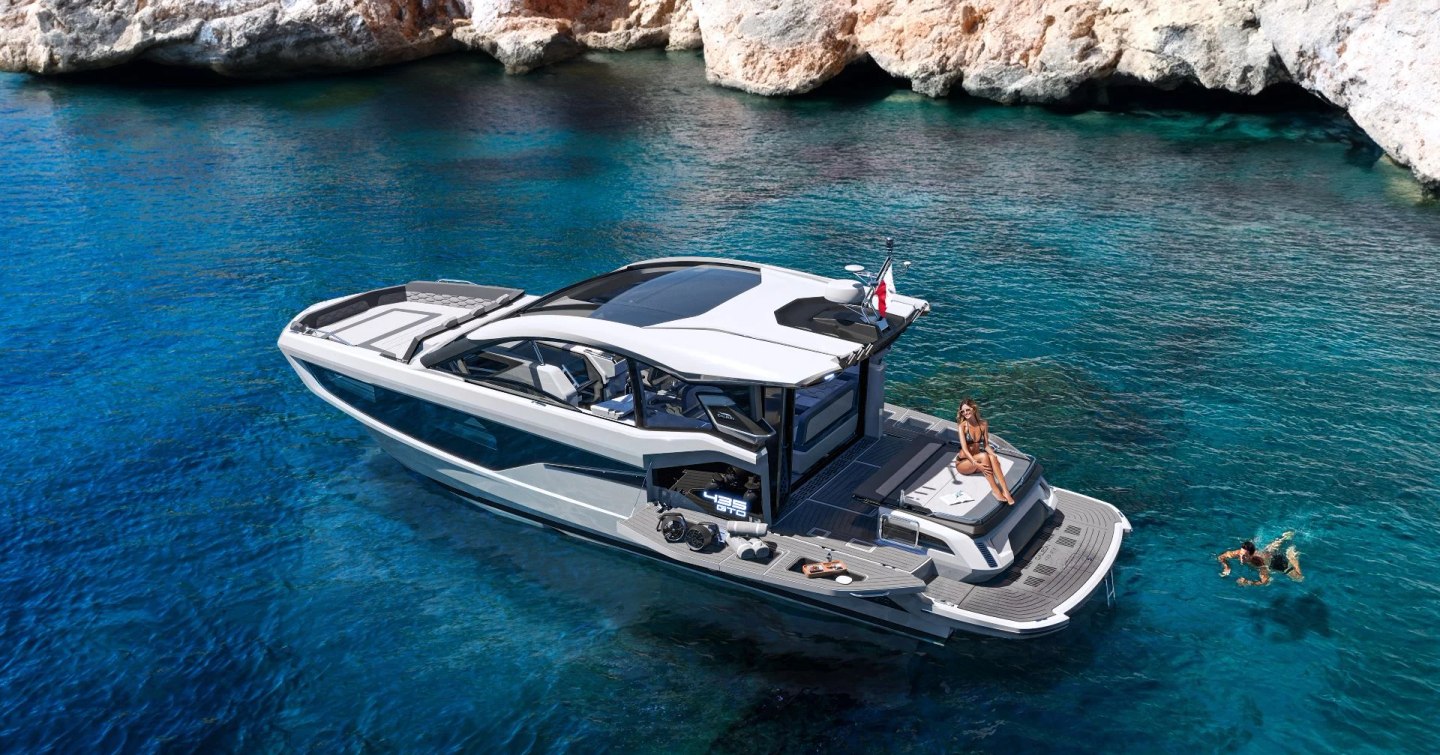 Galeon 435 GTI on water with swimmers around