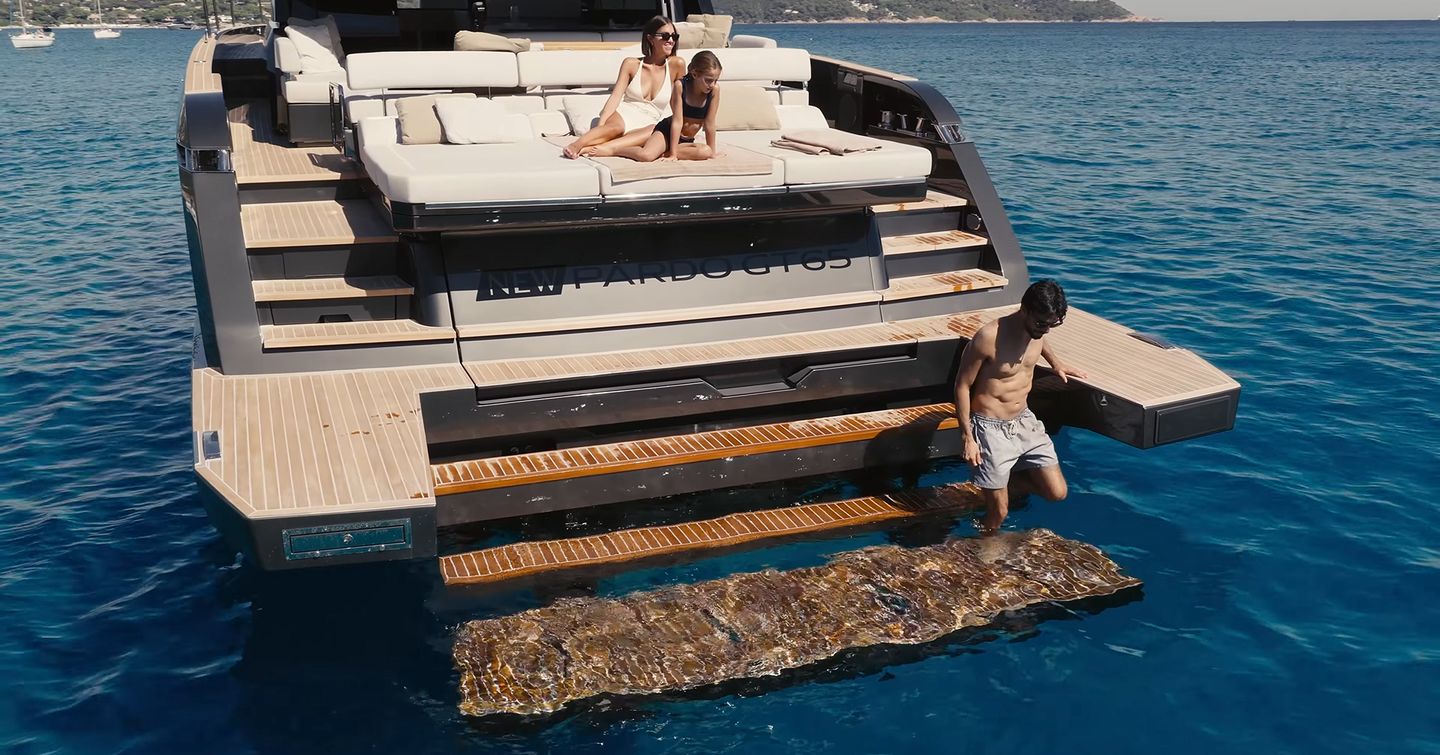 Pardo GT65 hydraulic bathing platform and aft sunpad at anchor