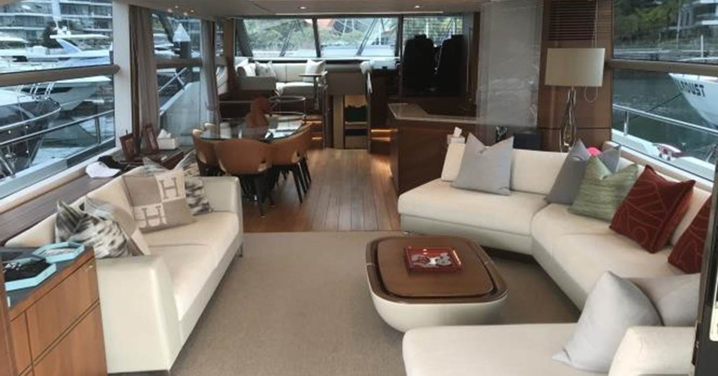 Motor Yacht Andaman Princess main saloon with curved white sofa