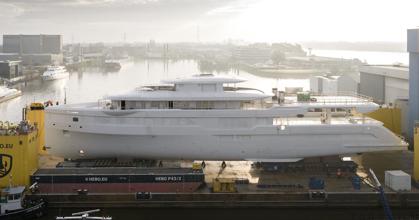 Starboard side shot of Feadship superyacht 719 leaving Feadship superyacht pre-outfitting