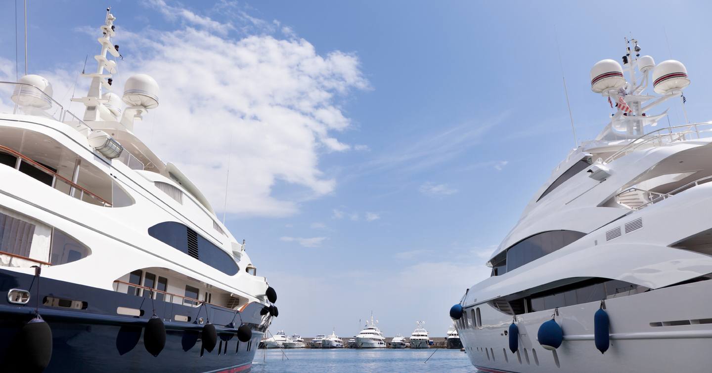 Two yachts moored side by side 