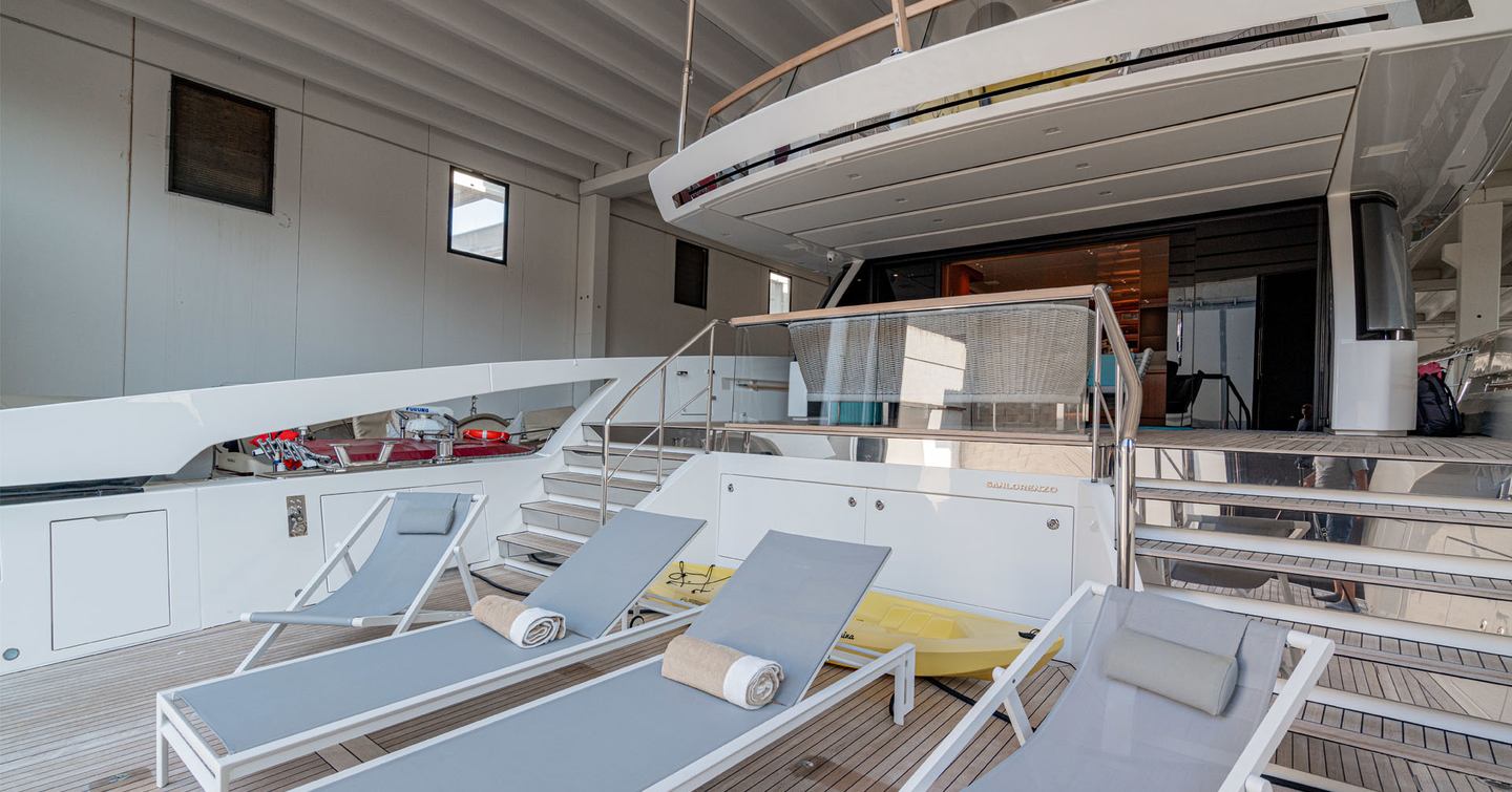 Motor yacht M&M's stern with loungers 