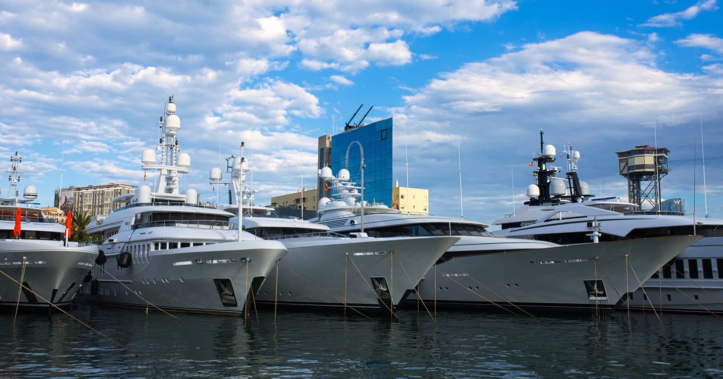 Row of superyachts berthed in Marina Vell, Palma, during Palma International Boat Show.