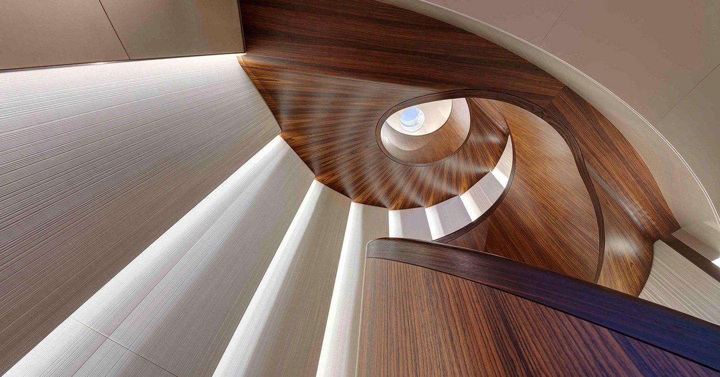 Superyacht Savannah spiral wooden staircase