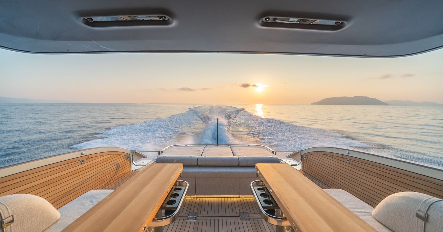 Invictus TT550 motor yacht aft deck under way