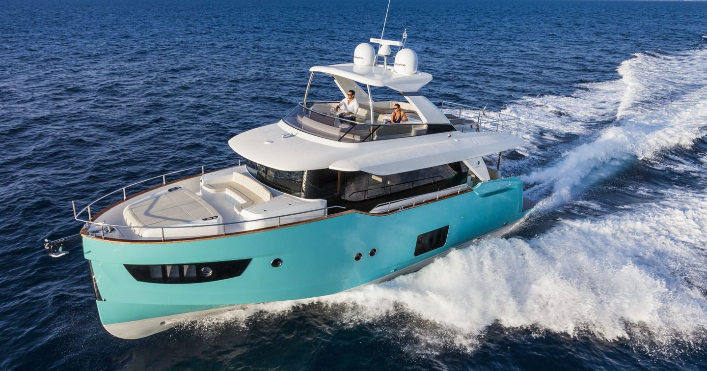 First generation Navetta 58 motor yacht under way