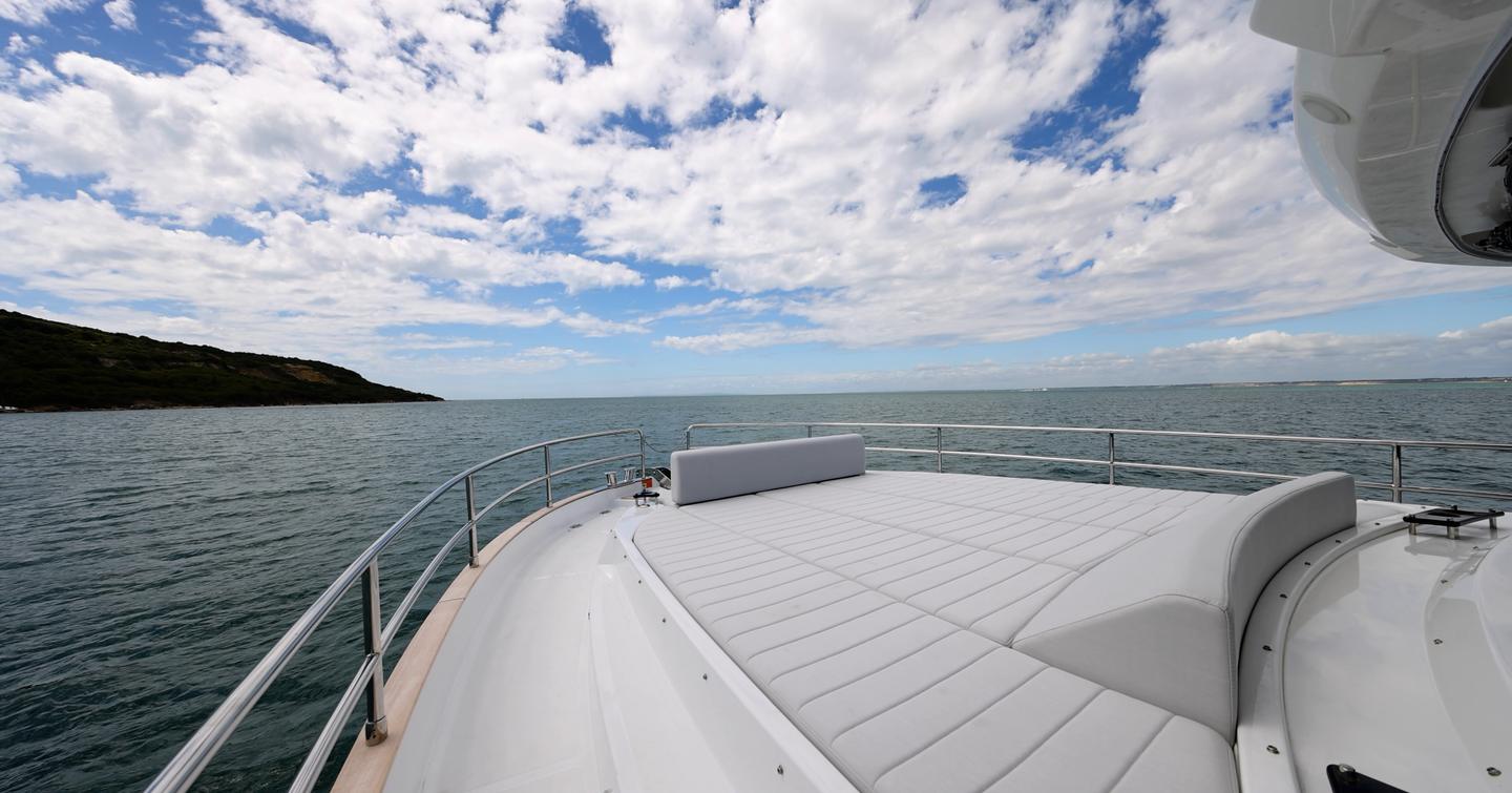 Sirena 48 foredeck sunpad with forward bench seating