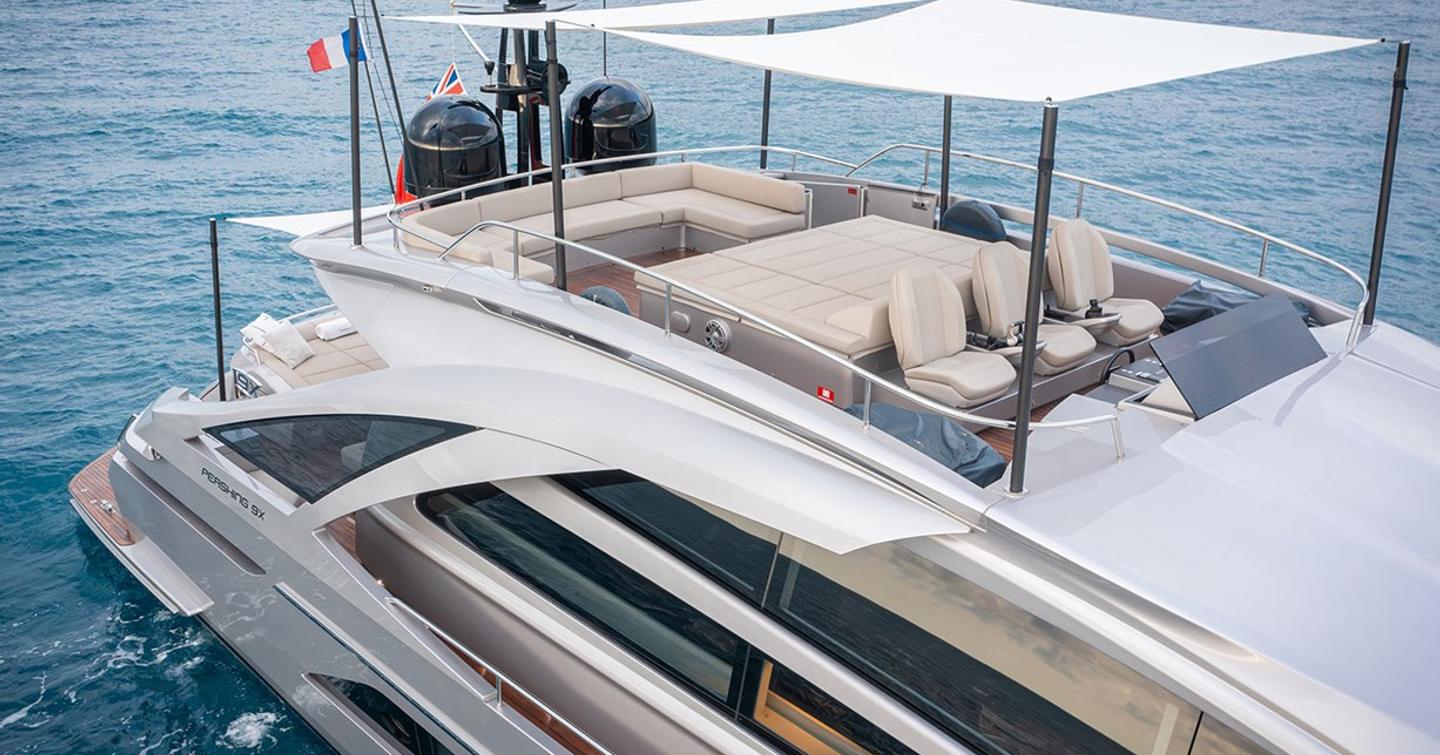 Motor yacht Magic of Ayr flybridge with shaded seating and sunpads