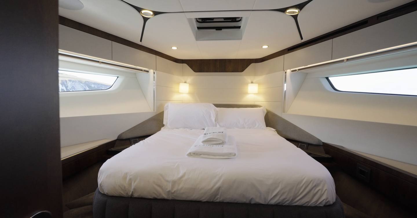 Fairline Targa 58 GTO forward VIP cabin with double bed and hull windows