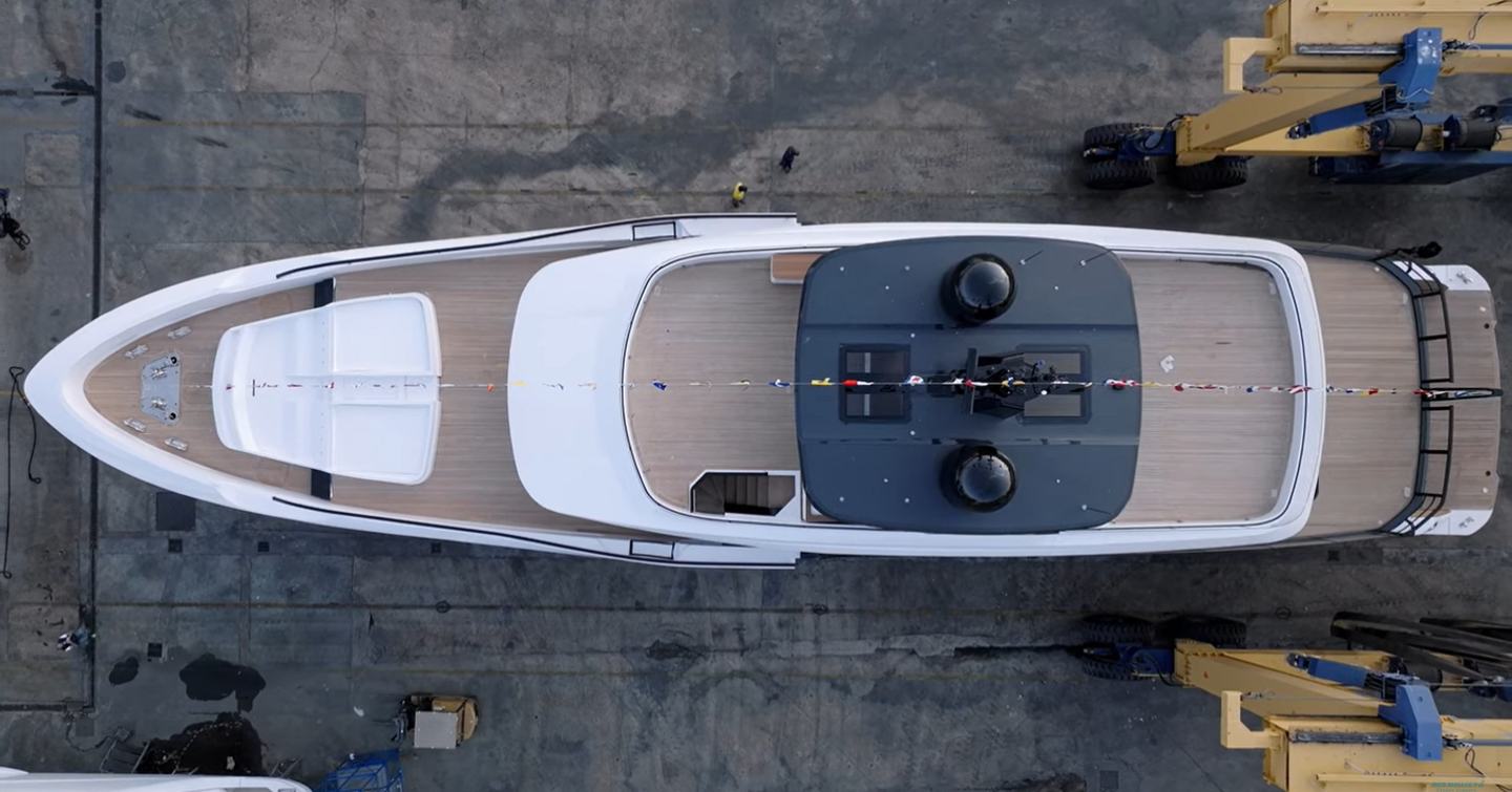 Aerial view looking down onto Oceano 39 emerging from construction shed