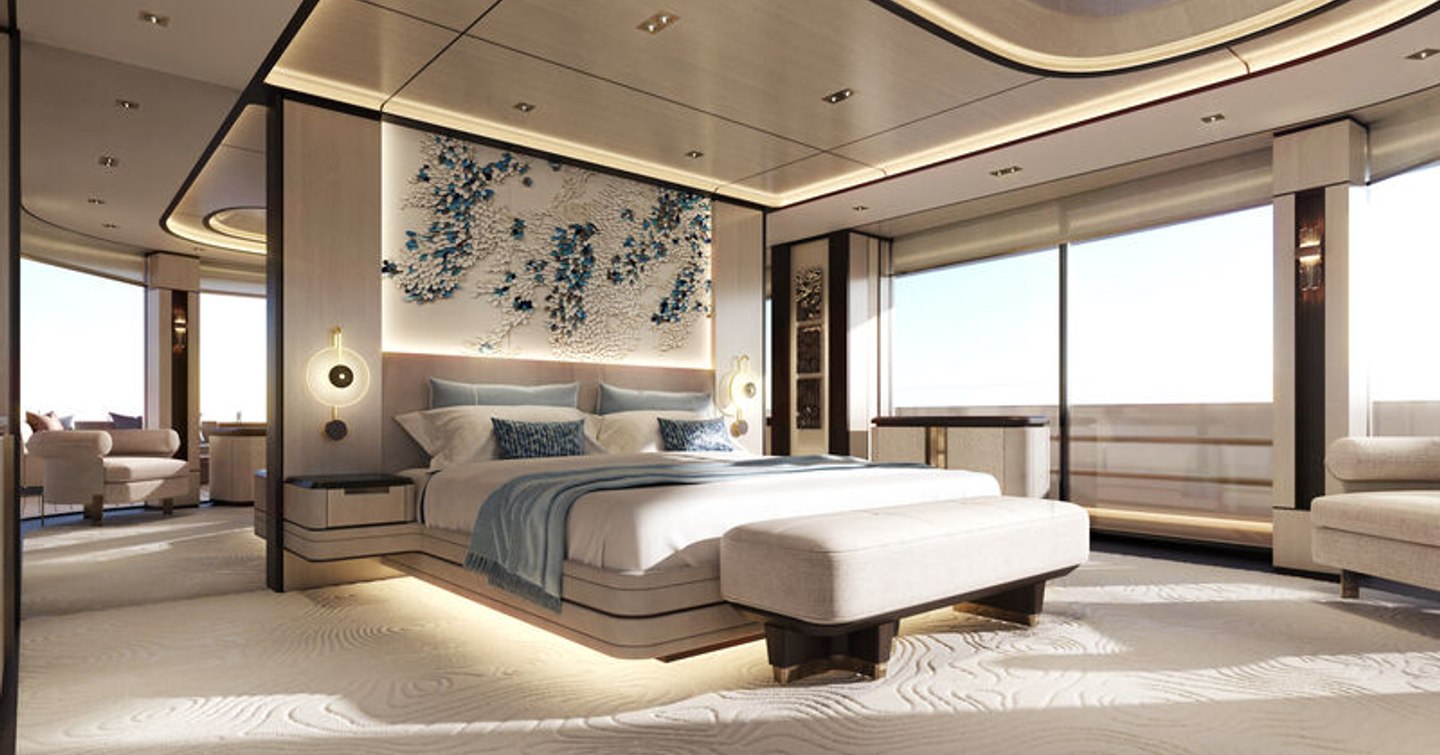 Overview of the master cabin onboard Admiral Panorama 50 superyacht. Central berth surrounded by wide vista windows. 