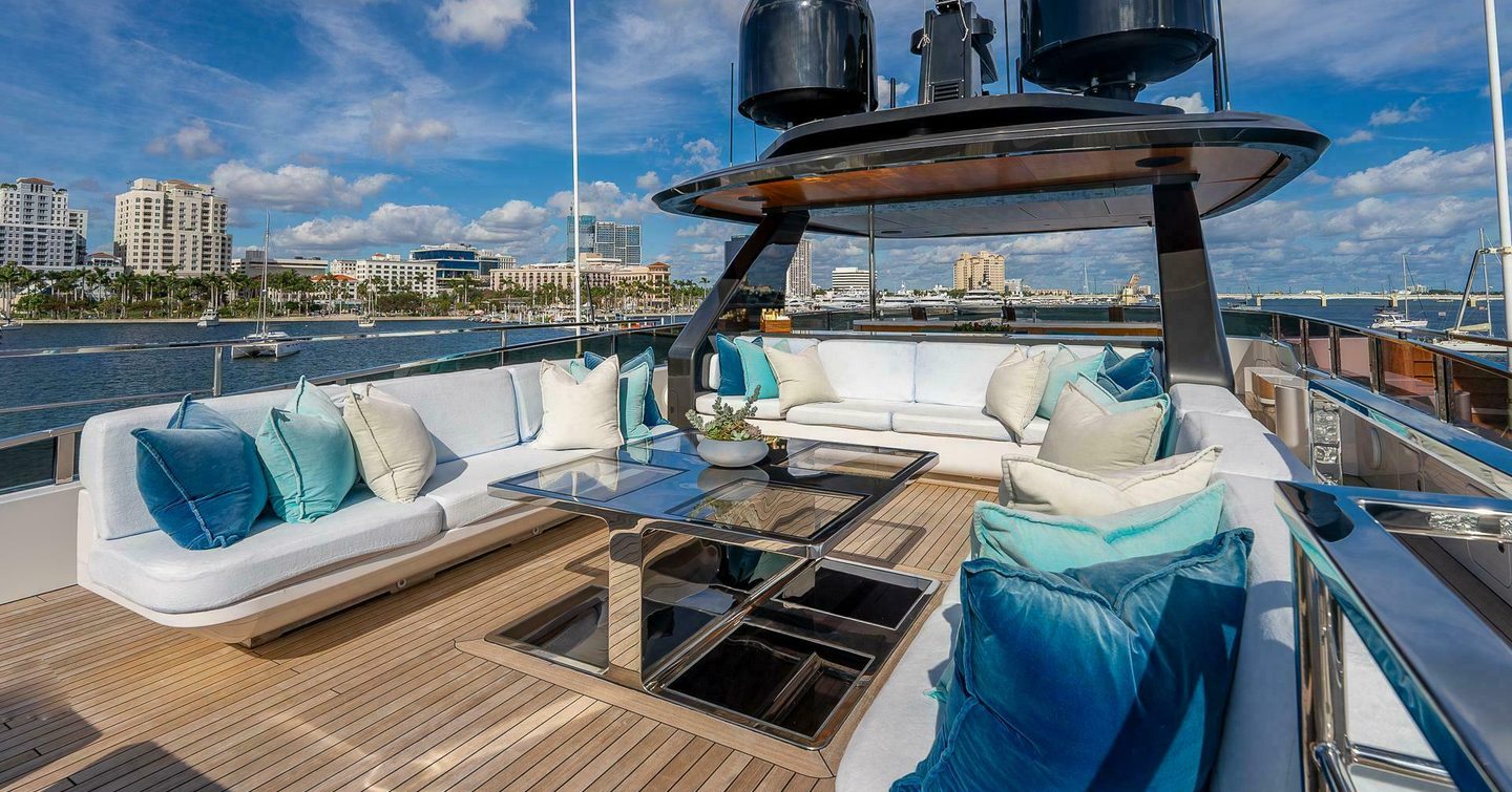 Superyacht Neverland's sundeck with white sofas