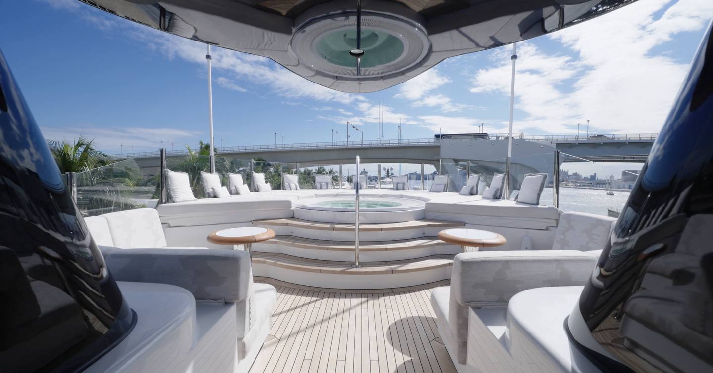 Sundeck hot tub on the Amels 242 Casino Royale surrounded by sunpads and panoramic views.