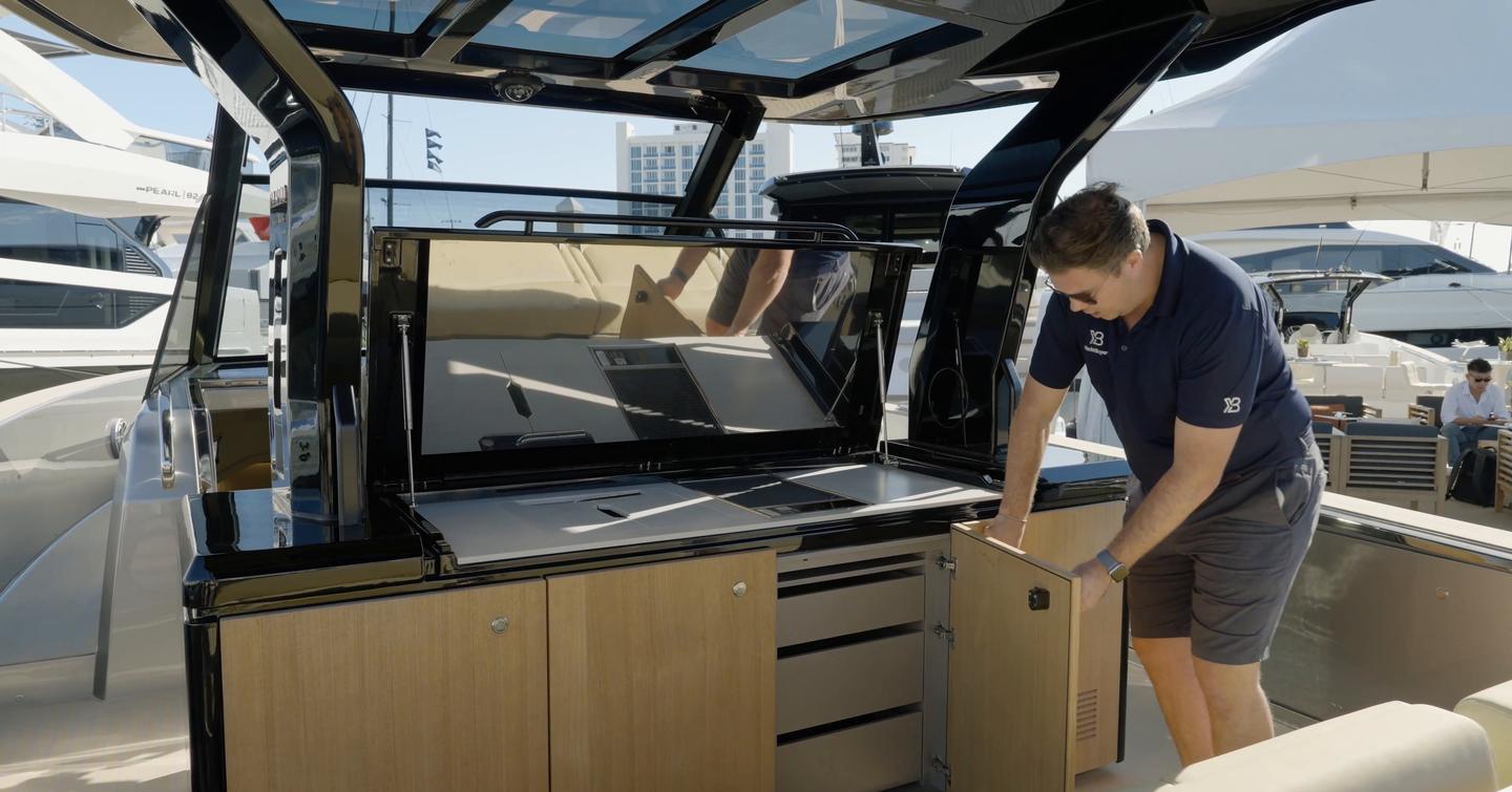 Pardo-43-Review-cockpit-galley-module-with-lift-up-grill-and-storage-lockers