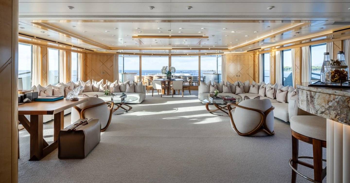 AHS main saloon with white seating and bar area