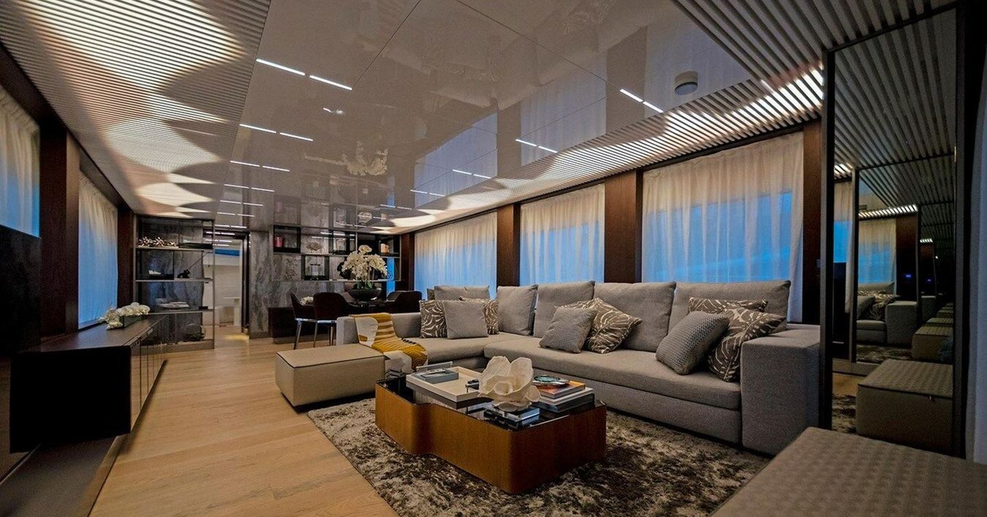 Motor yacht Alter Ego main saloon with L-shaped sofa
