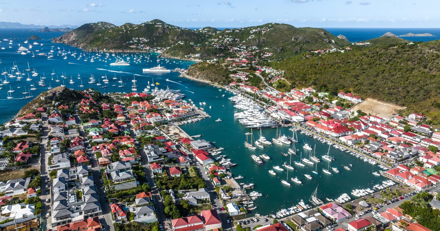 Superyachts in Port de Gustavia and at anchor off St Bart's for New Years Eve