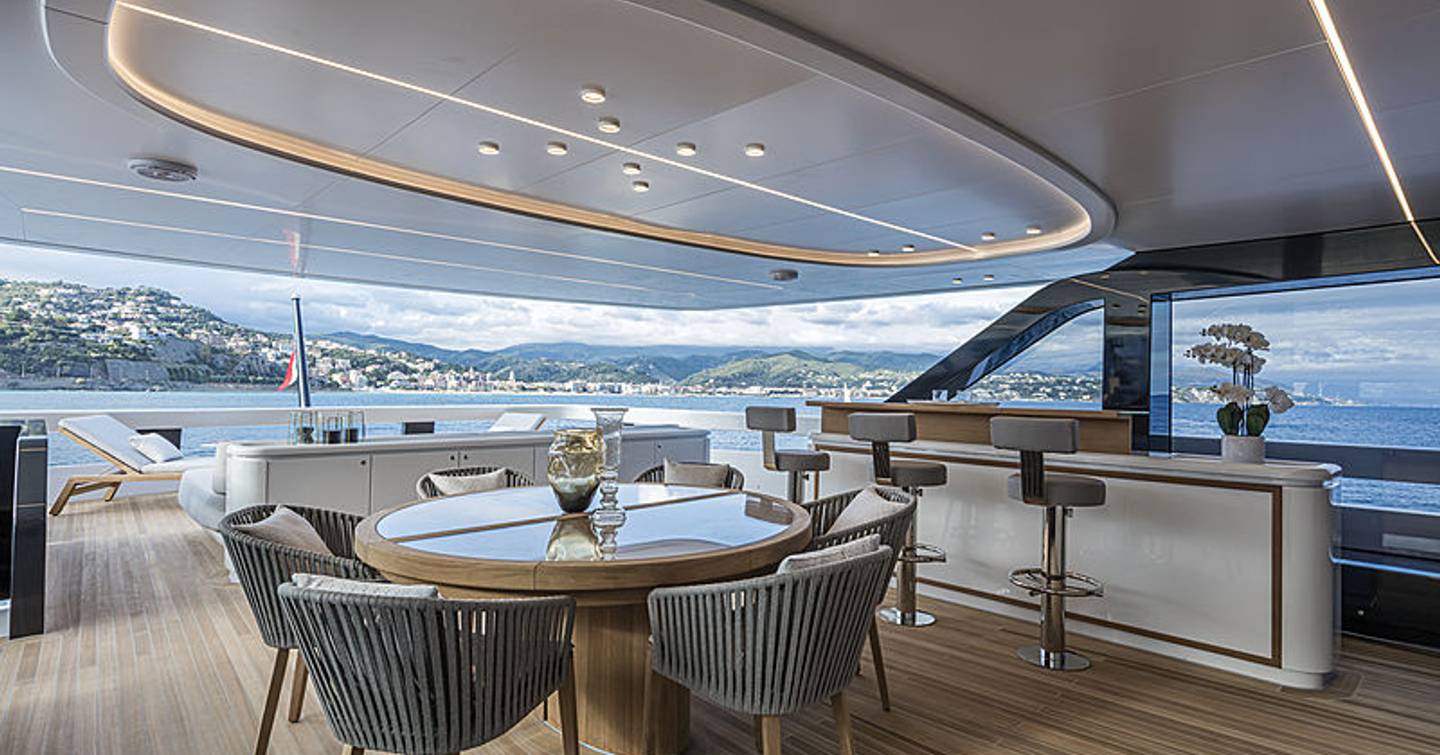  Superyacht L.A.U.L upper deck with circular dining table and bar