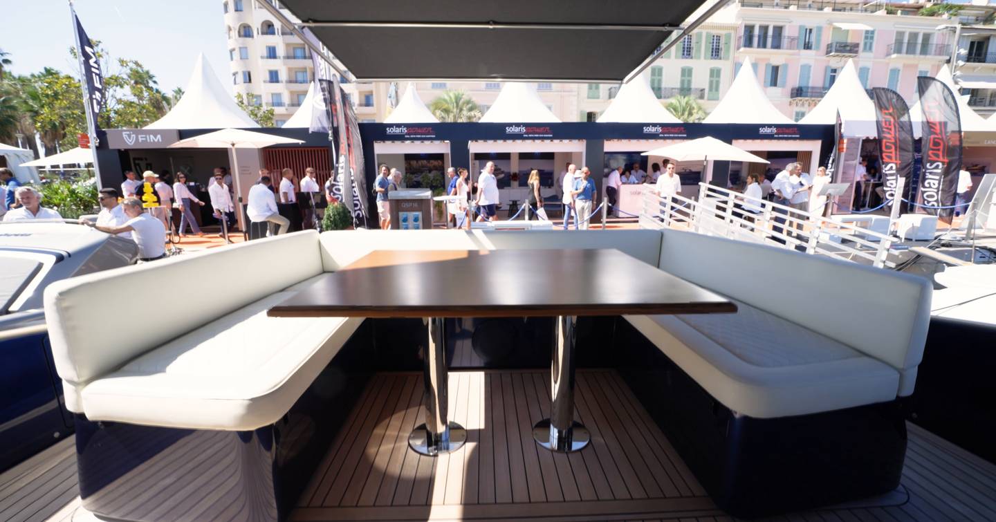 Solaris-Power-60-Coupe-Review-aft-cockpit-dinette-with-wraparound-seating