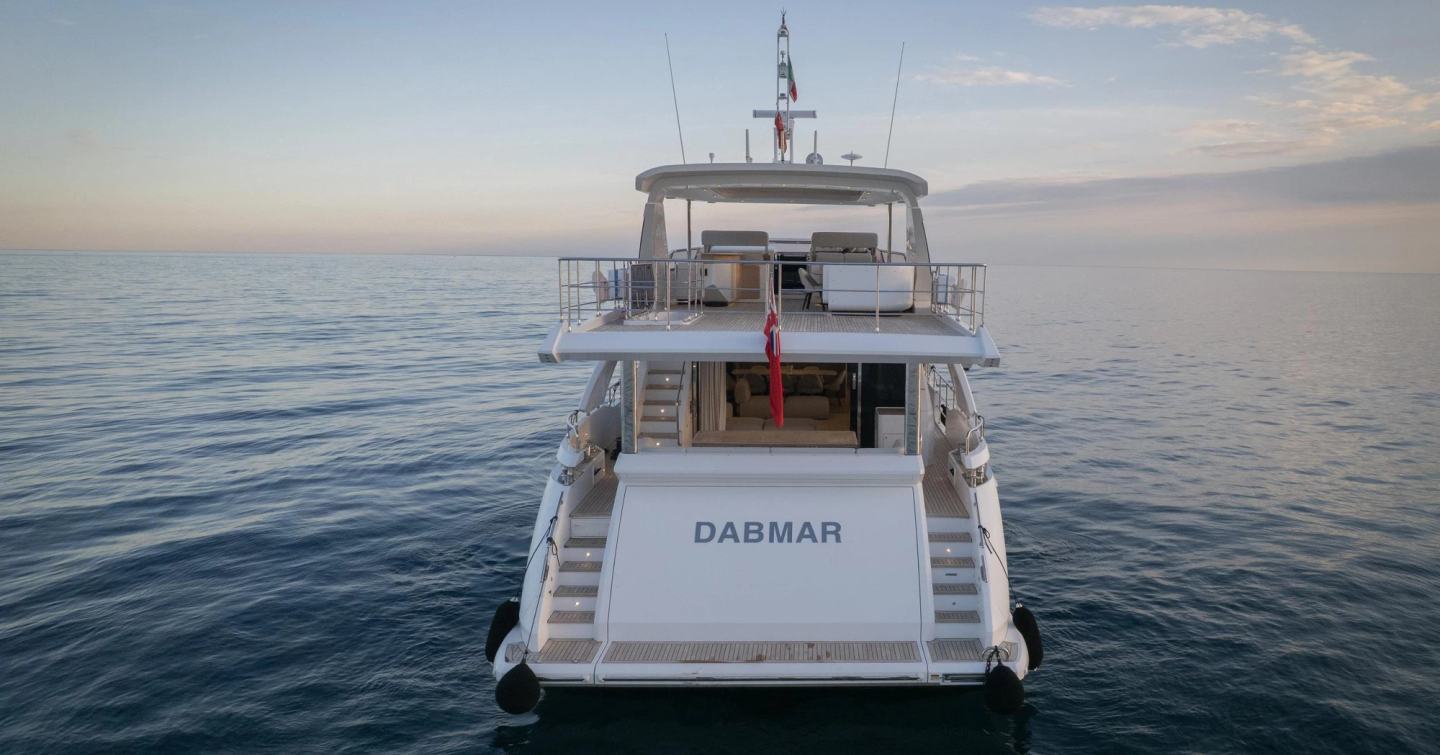 Motor yacht Dabmar aft decks at anchor