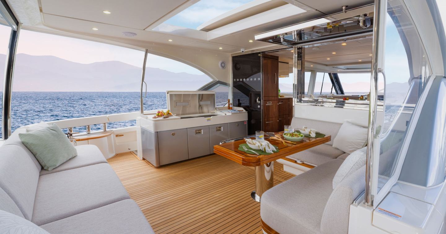 Riviera 6200 yacht aft deck dining area 
