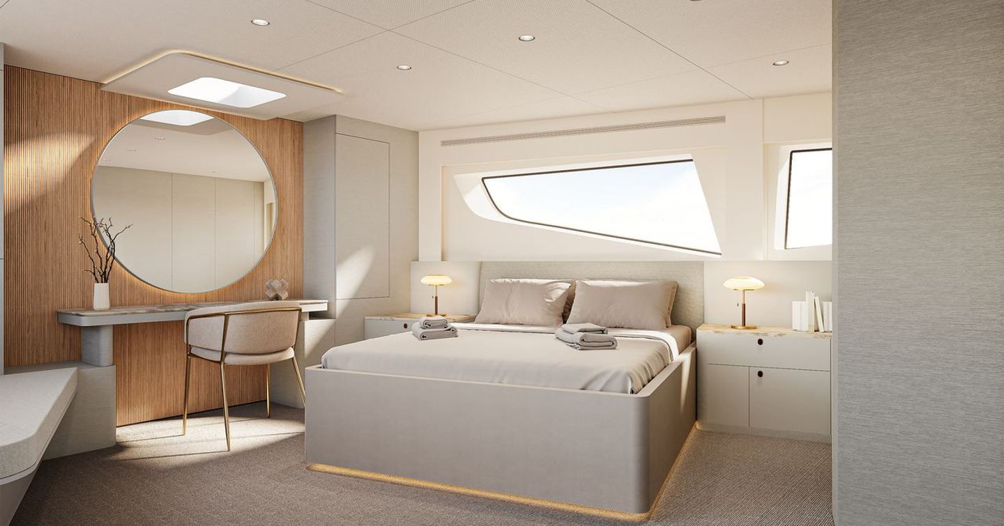 Guest cabin with circular mirror and vanity on motor yacht 27XP