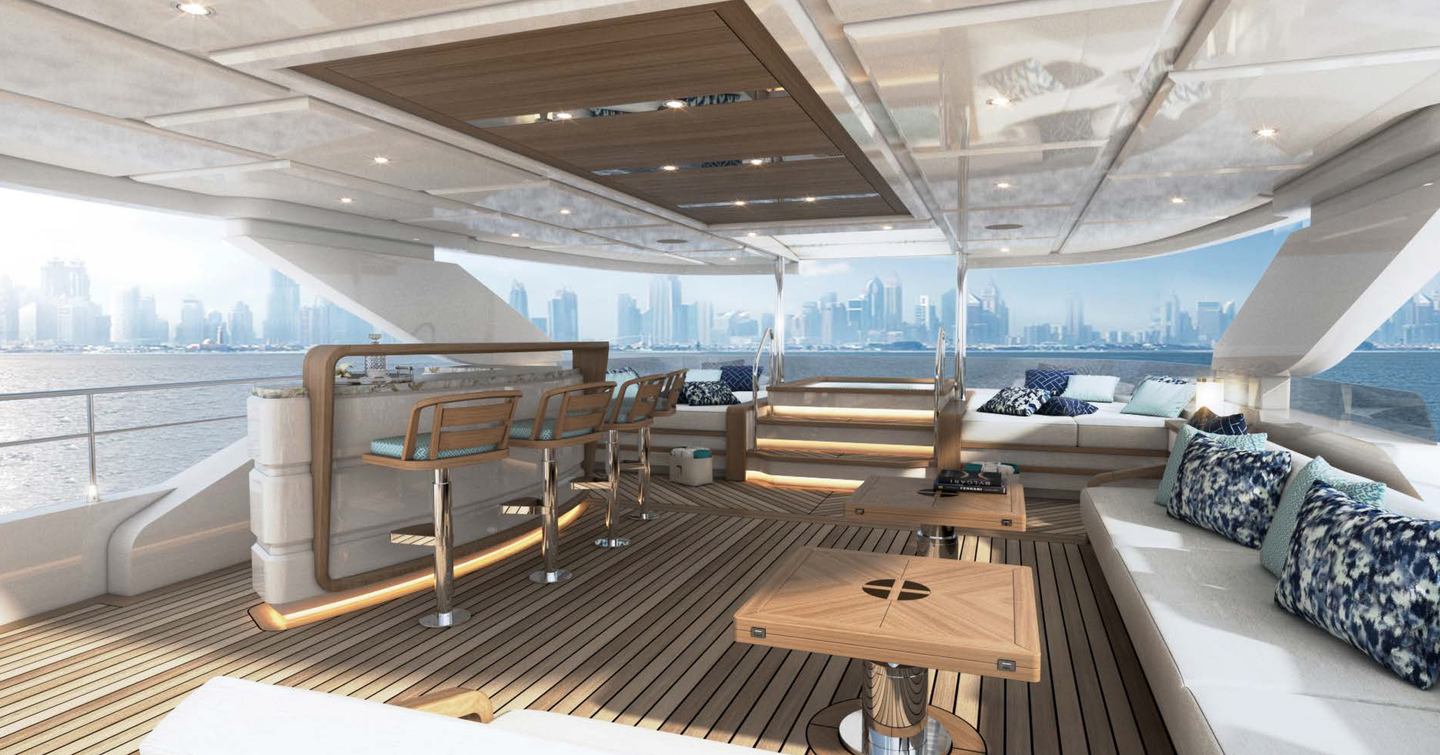 Majesty 120 sun deck, wet bar to port side and sofas to starboard and rear.