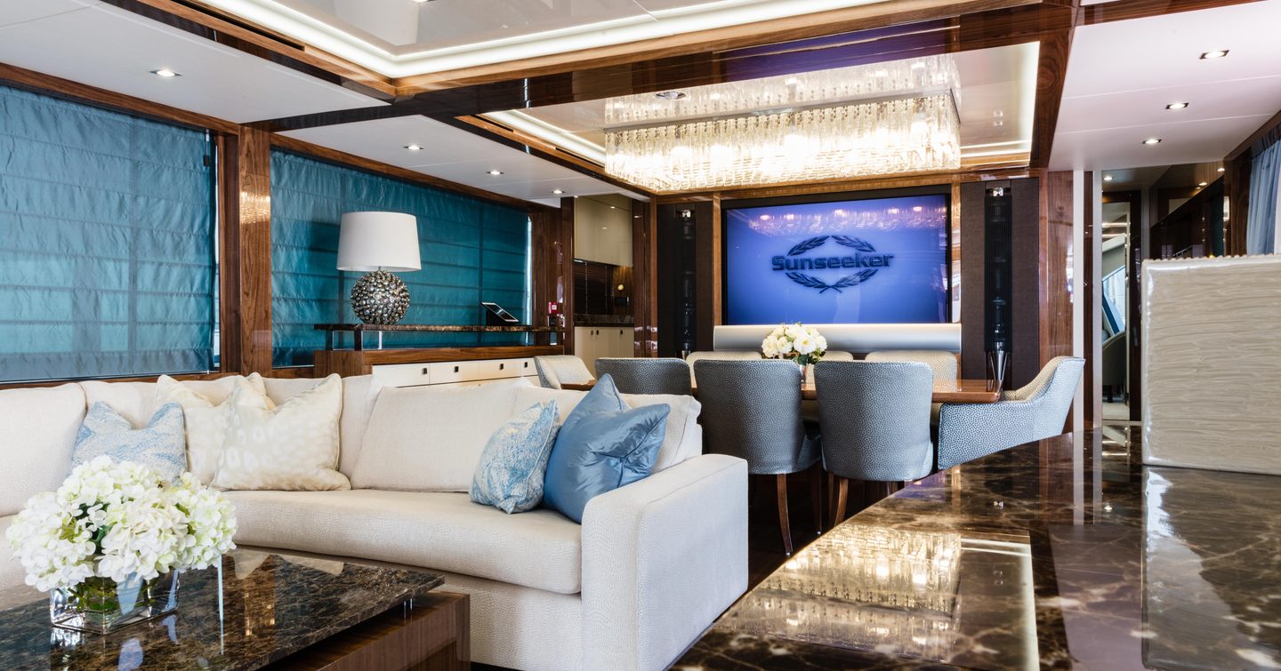 Interior of motor yacht with Sunseeker logo on TV